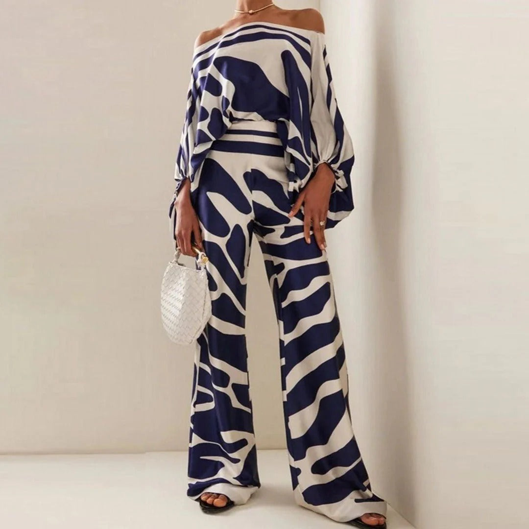 Elegantes, abstraktes Zweiteiliges Set für Frauen in Blau und Elfenbein.