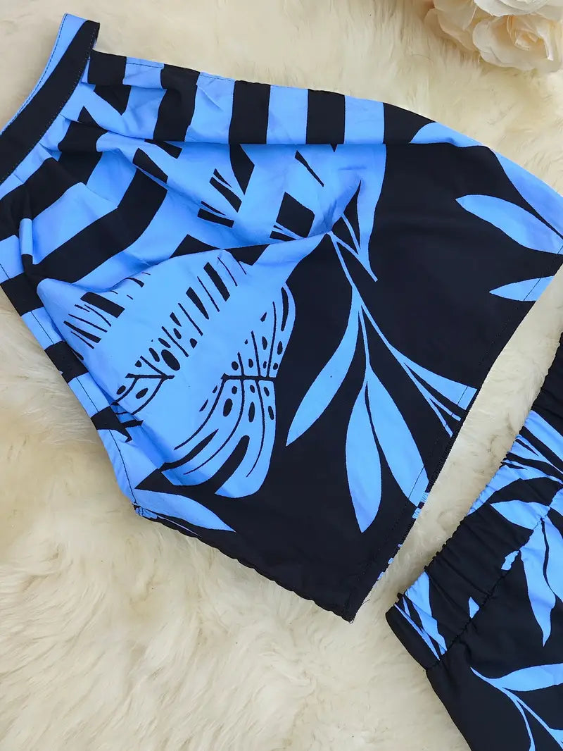 Tropisches Haltertop und weite Hose für Frauen in elegantem Design. 12