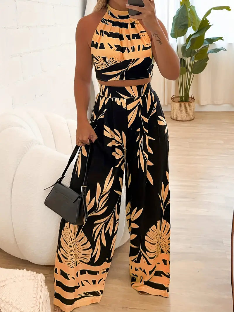 Tropisches Haltertop und weite Hose für Frauen in elegantem Design. 3