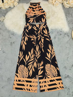Tropisches Haltertop und weite Hose für Frauen in elegantem Design. 4
