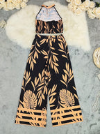 Tropisches Haltertop und weite Hose für Frauen in elegantem Design. 5